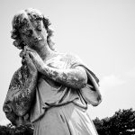 statue in the old cemetery la Reina in Cienfuegos, Cuba