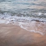 waves at sunset in Praia dos Golfinhos beach