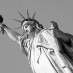 side close up on the statue of liberty national monument in new york in black and white NYC USA