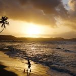 the sun is going down on the Pipa beach and it's beautiful