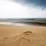 beach on the Bazaruto island by the sand dunes during a storm in Mozambique