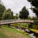 white walking bridge in den Bosch in front of the Bolwoningen