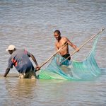 two men fishing in the indian ocean in Beira Mozambique