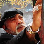Portrait of Salvador Gonzalez Escalaonaportrait of Salvador Gonzalez Escalaona painting in the street of Callejon de Hamel in la Havana Cuba in 2016