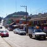 view of the main shopping street of San Juan de Chamula in Chiapas Mexico