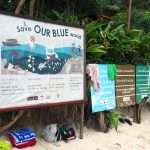 save our blue world sign in Maya Bay in Krabi Thailand before the closure of the beach