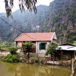 local house in Tam Coc rice fields seen from the biking route in Vietnam