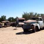 abandoned old cars at Solitaire, the only gas station in the south of the Namibia desert