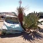 an old rusted car at the Solitaire gas station in the Namib desert in Namibia