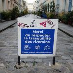 a sign at the entrance of the Rue Cremieux in Paris asking visitors to respect the neighbourhood